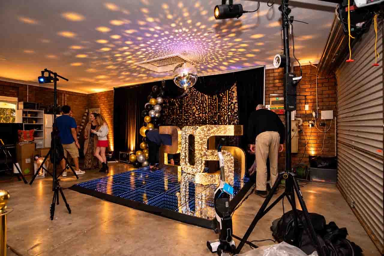 Guest celebrating on a luxury LED dance floor