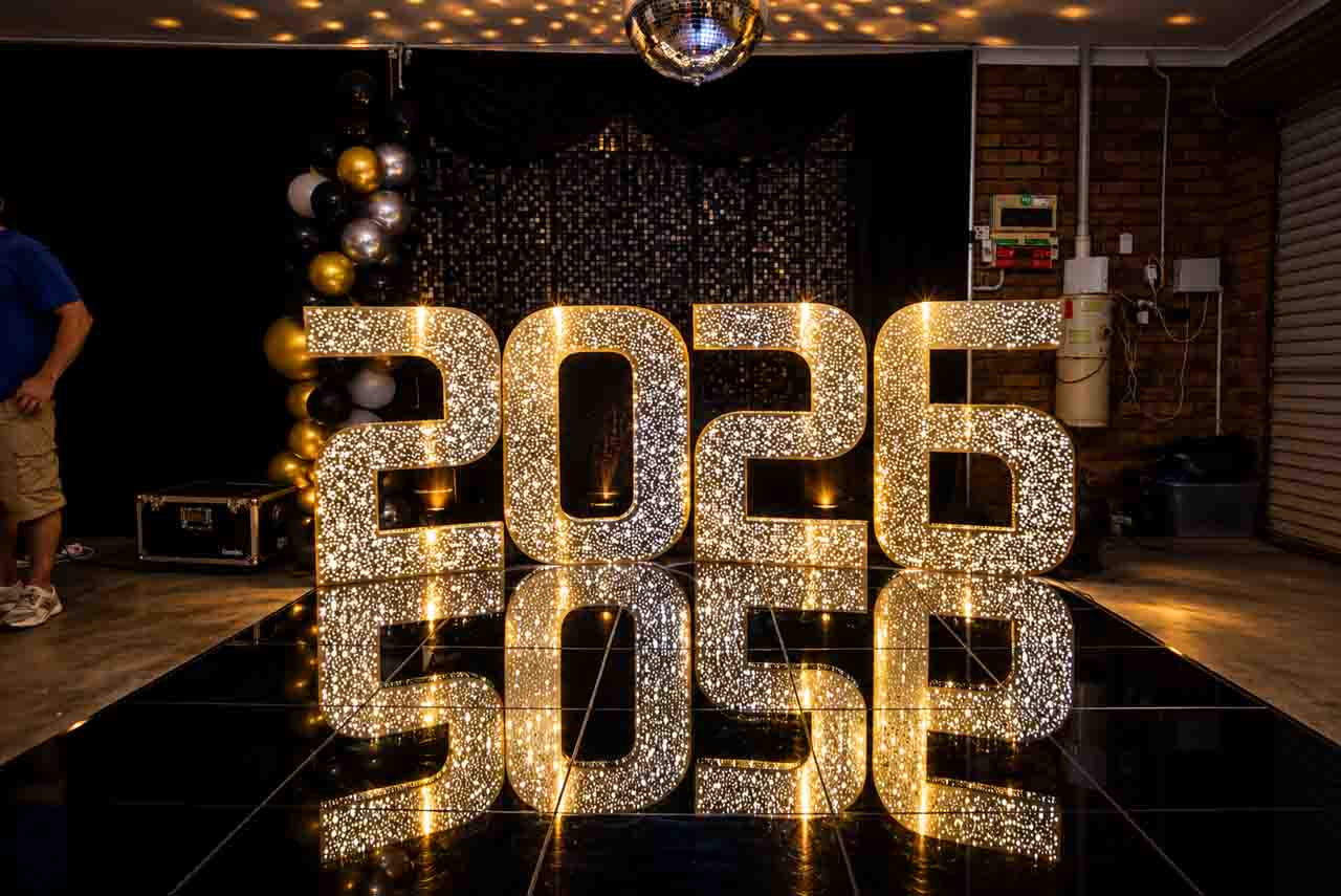 Illuminated event numbers creating a dramatic celebration backdrop